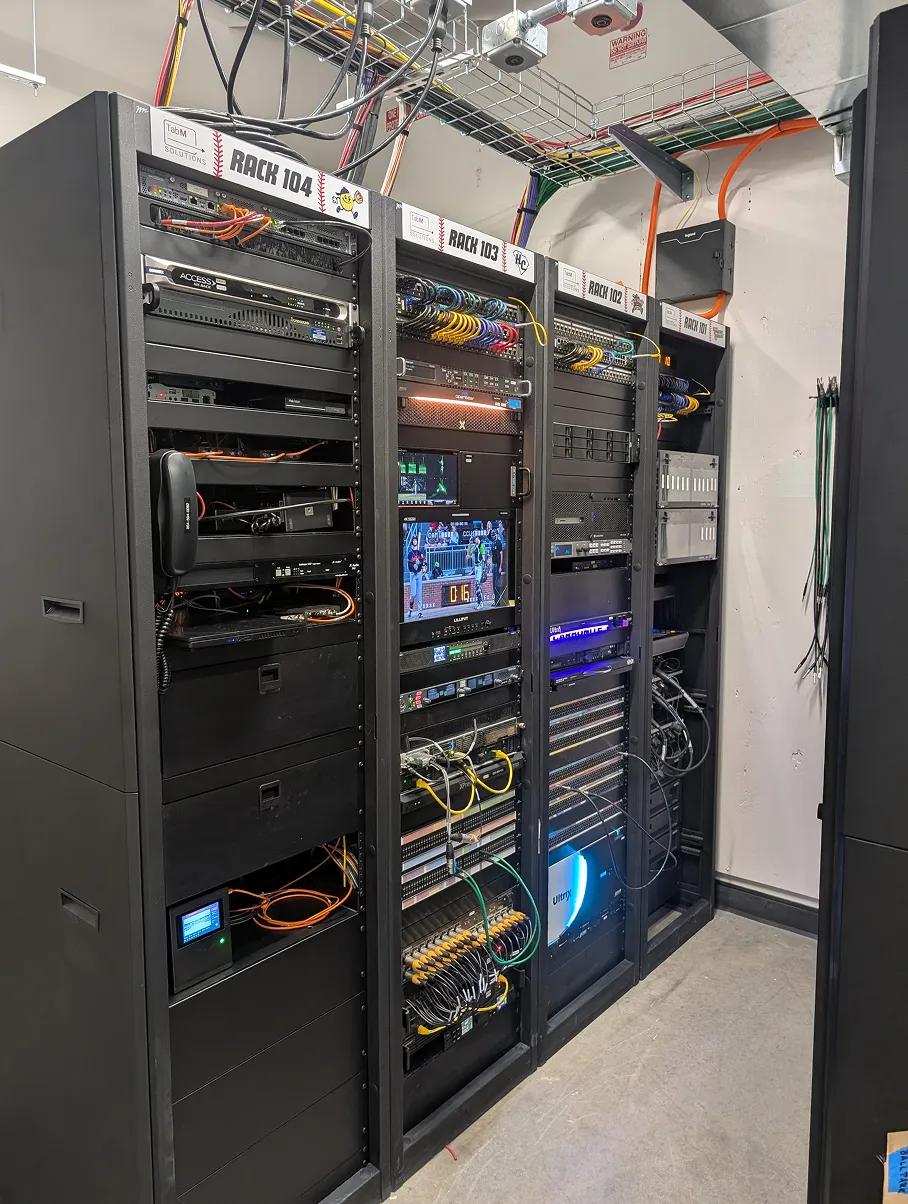 Professional broadcast equipment racks in the TOC featuring Ross Video and Evertz infrastructure for Hub City Spartanburgers.