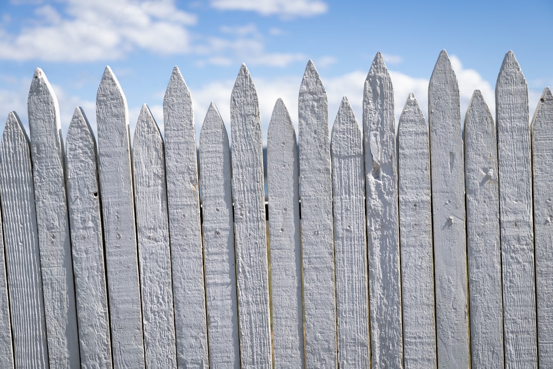 classic white picket fence - cost of wood fence installation