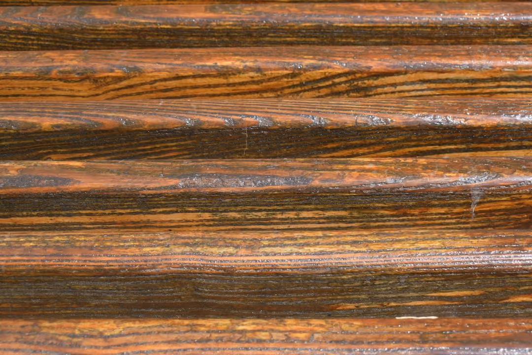 Close-up on cedar fence pickets showing wood grain - cost of 6 ft cedar fence installed Close-up on cedar fence pickets showing wood grain - cost of 6 ft cedar fence installed