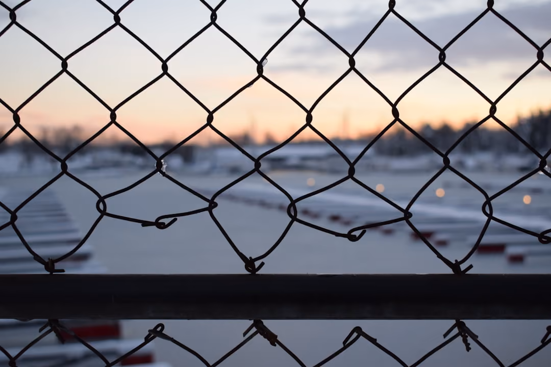 Stainless steel fence at an airport facility - stainless steel chain link Stainless steel fence at an airport facility - stainless steel chain link