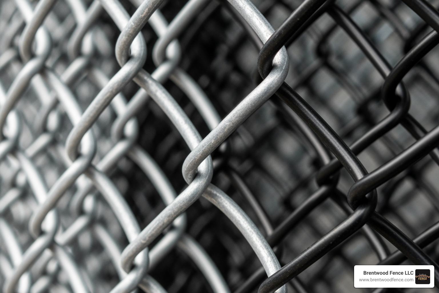 a close-up of galvanized and black PVC-coated chain link fabric - cyclone chain link fence