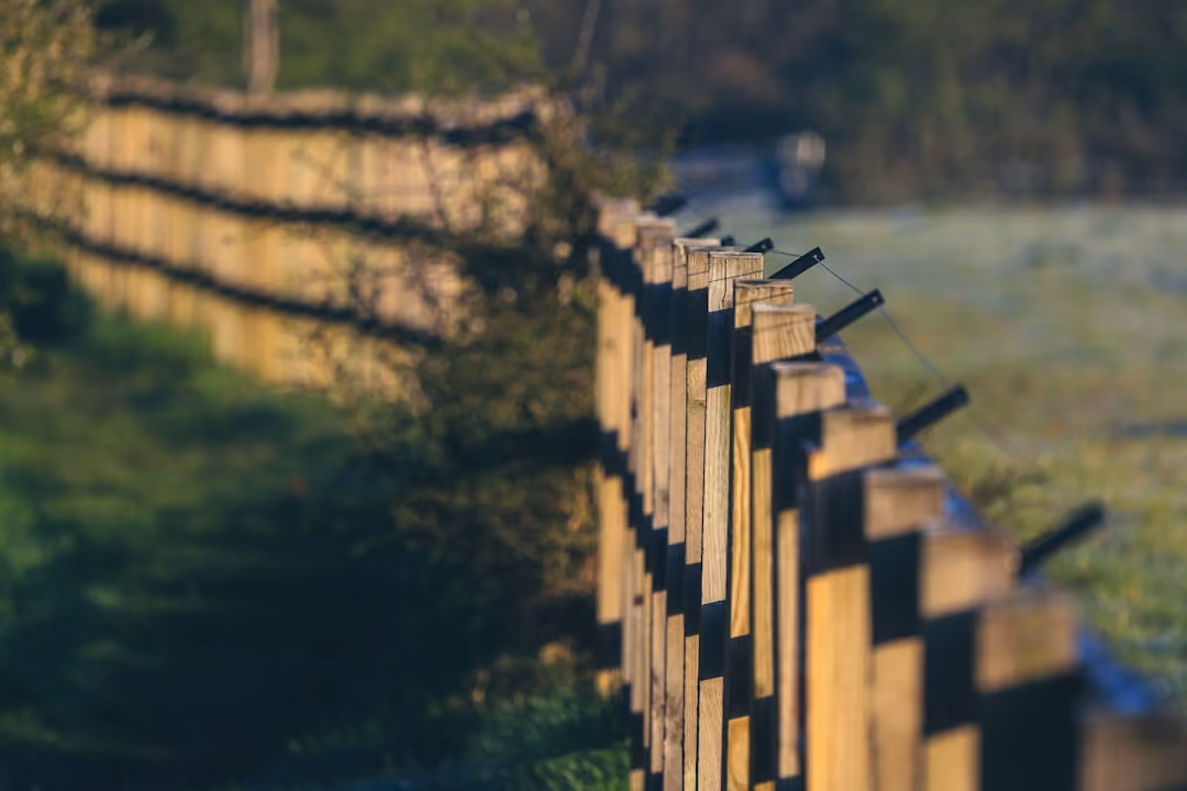 professional wooden fence installed in NH Get the true cost of wood fence per linear foot. Explore factors, materials, labor, and budgeting tips for your new fence project concept