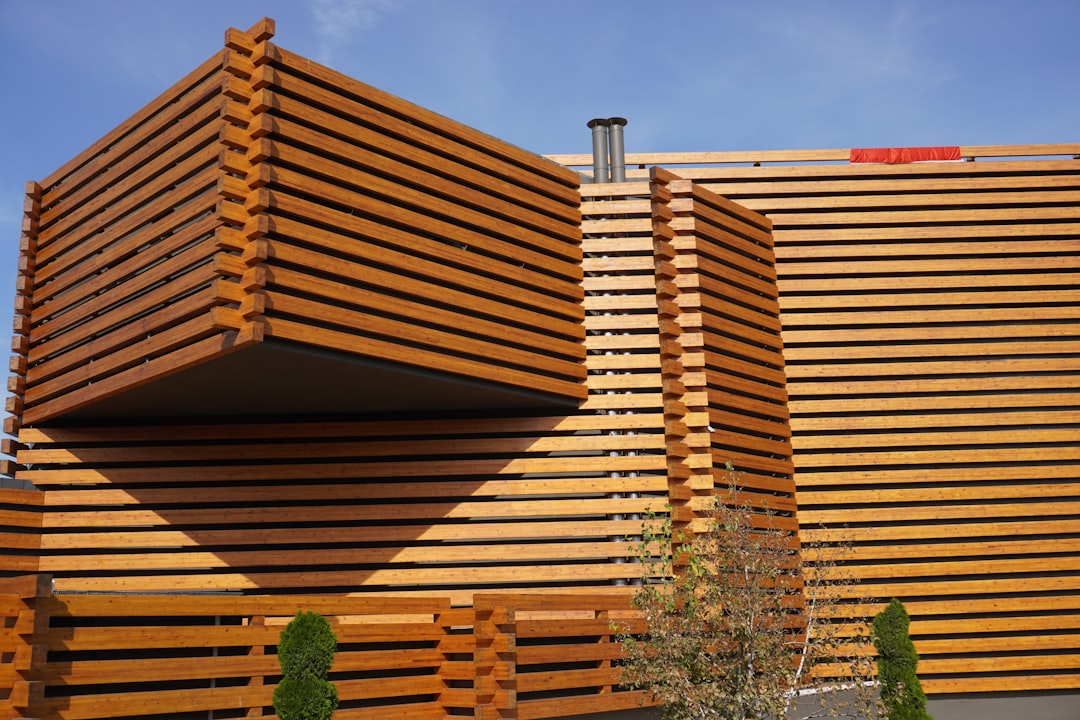 Modern horizontal wood privacy fence in a residential yard