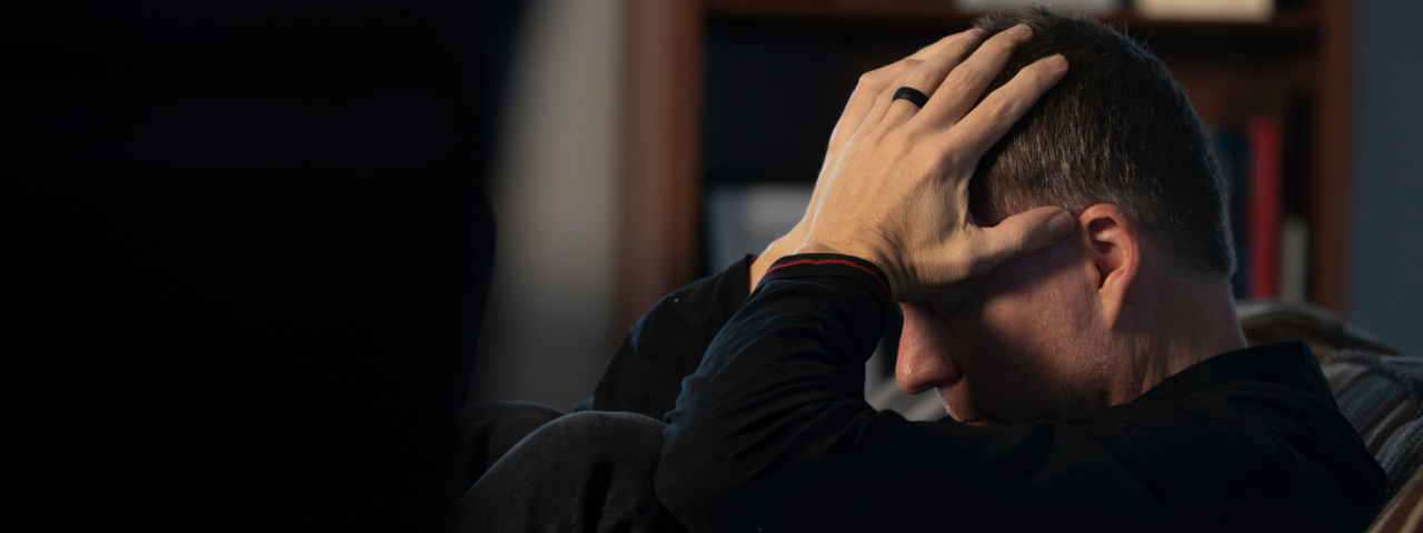 Stressed man with hands on his head, symbolizing frustration after launching an online store that isn't ready to convert.