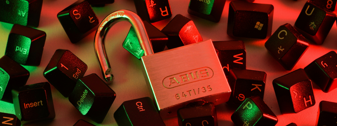Padlock and keyboard keys symbolizing code security and governance in Shopify development.