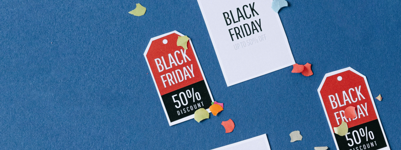 Black Friday discount tags representing intense promotional competition during BFCM.