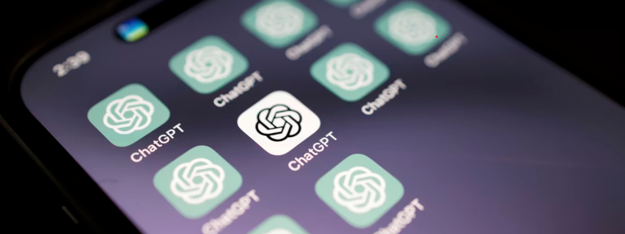 Smartphone screen displaying multiple ChatGPT app icons arranged in a grid, with one icon prominently in the center.