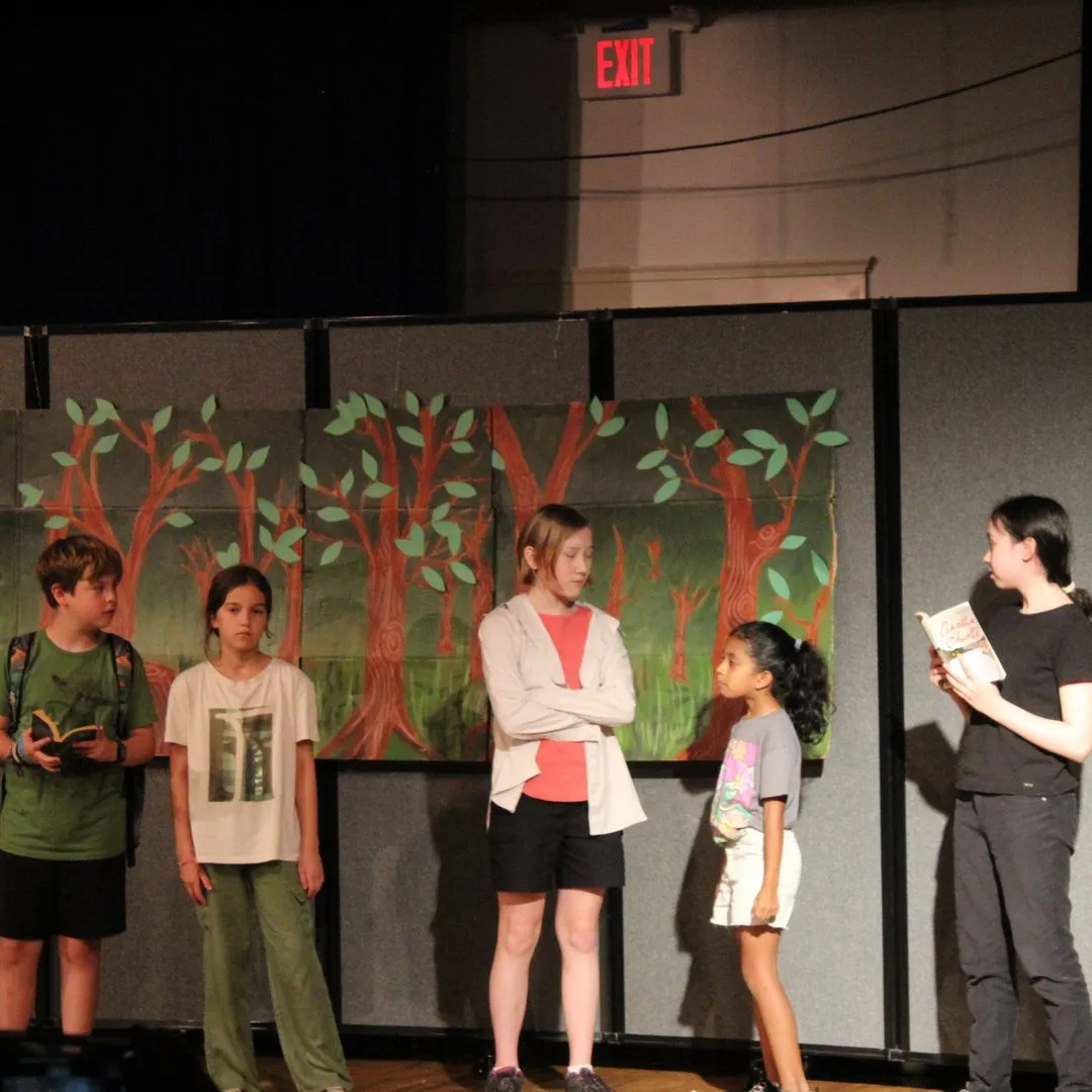 5 students acting in a play