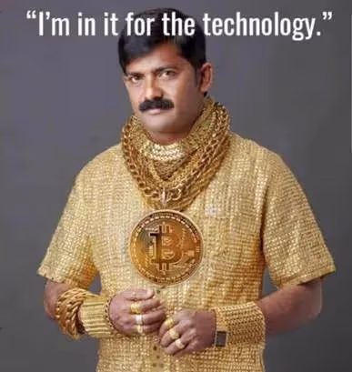 A person wearing a gold shirt and necklacesAI-generated content may be incorrect.