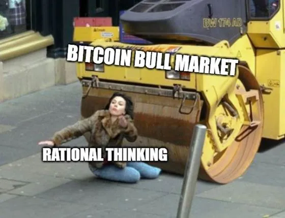 A person kneeling on the ground next to a large yellow rollerAI-generated content may be incorrect.