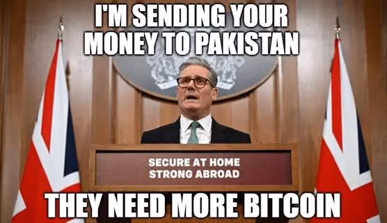 A person in a suit and tie standing at a podiumAI-generated content may be incorrect.