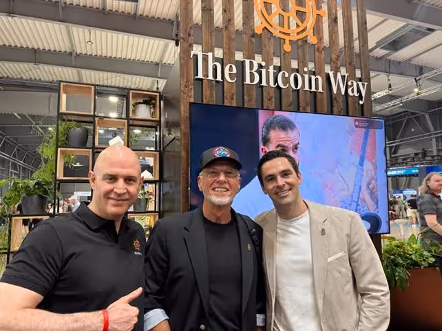 A group of men posing for a pictureAI-generated content may be incorrect.