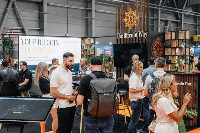 A group of people in a roomAI-generated content may be incorrect.