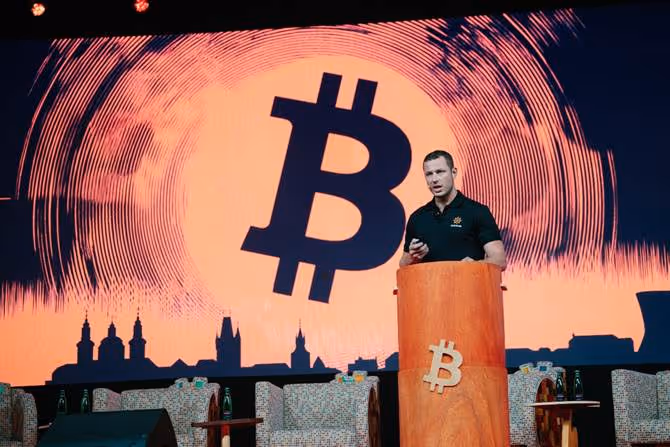 A person standing at a podiumAI-generated content may be incorrect.