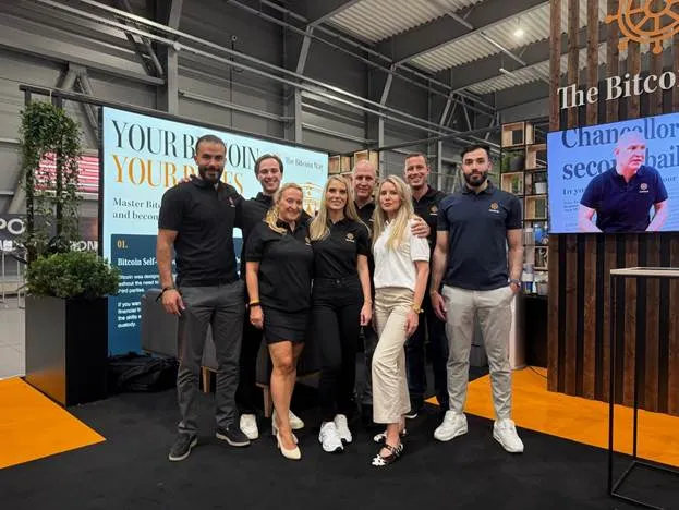 A group of people posing for a photoAI-generated content may be incorrect.