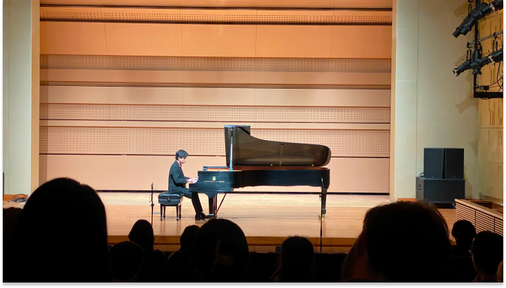 man performing piano
