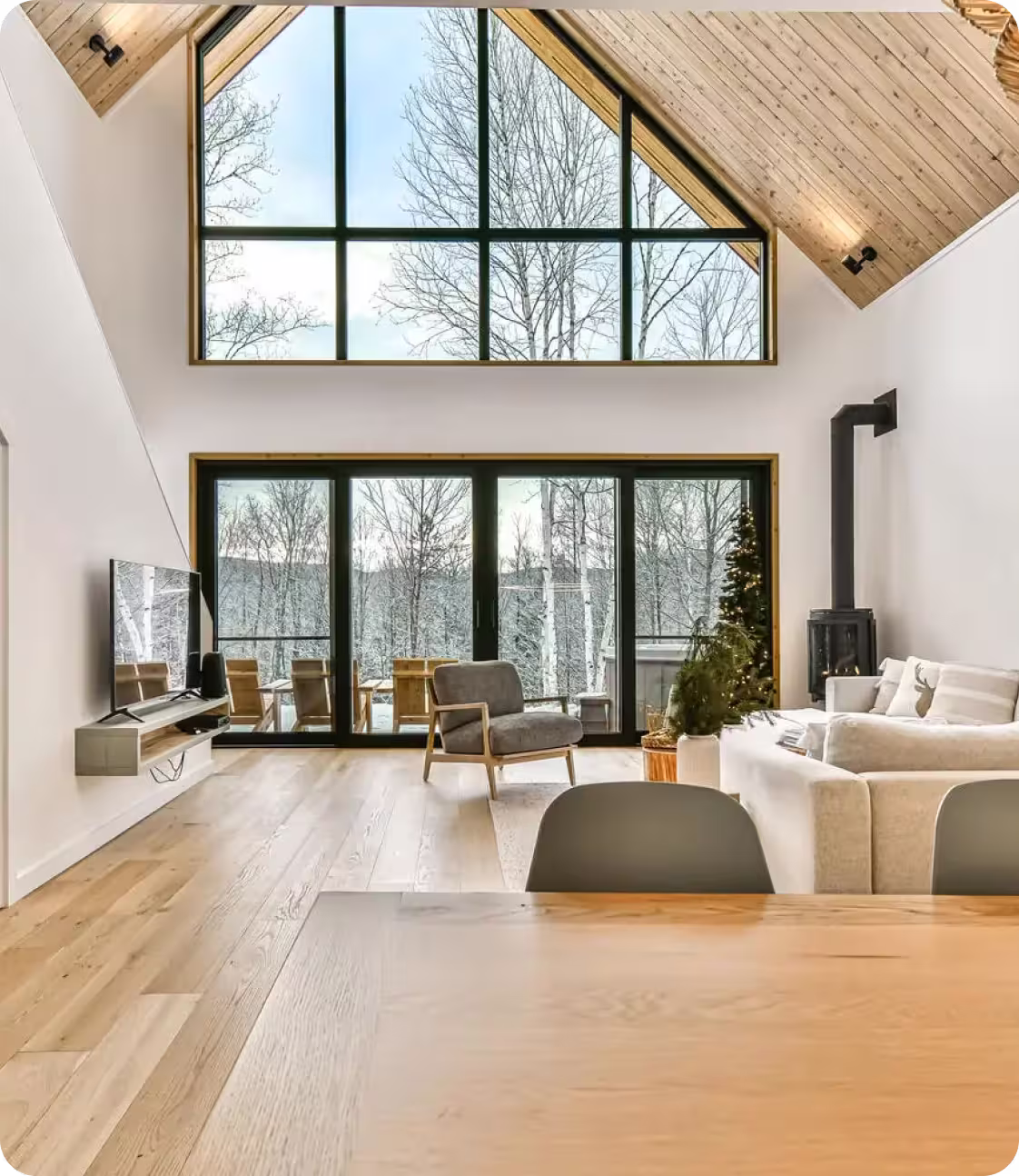 A view of the living room and the front window from the diner table 