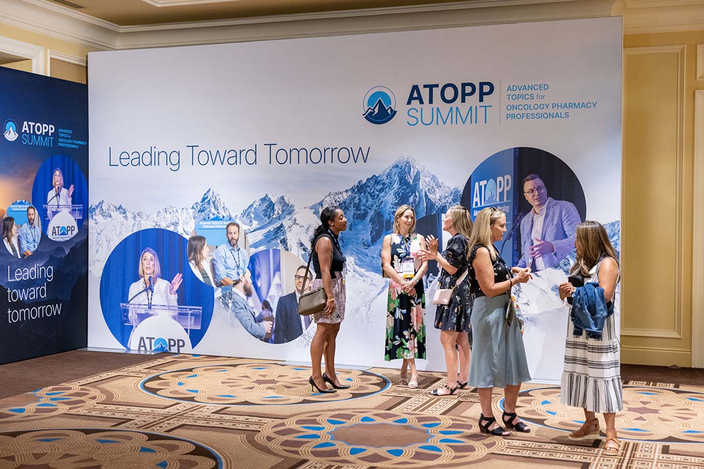 Image of people sitting at a conference