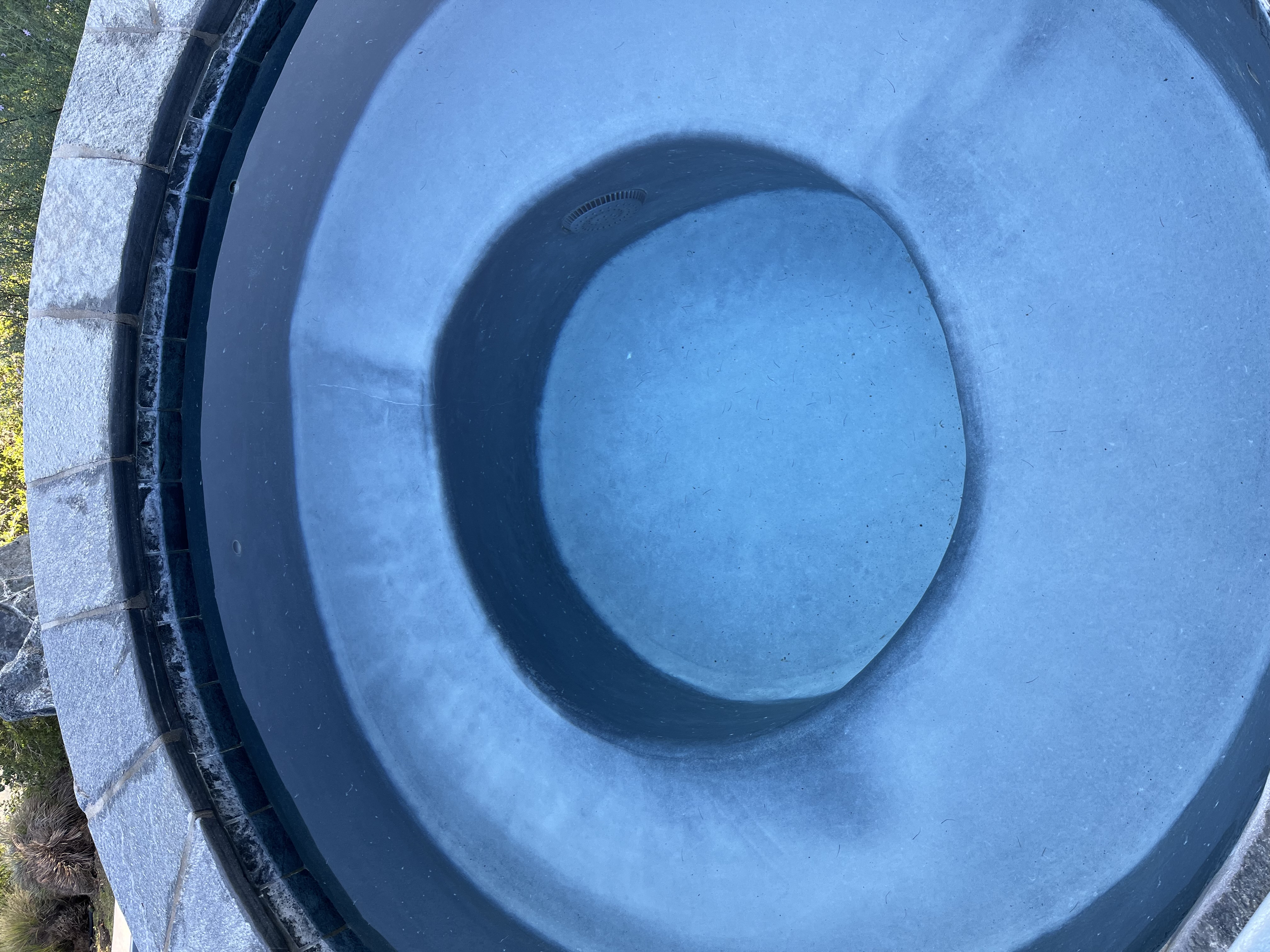Calcium scale on a beautiful blue spa.