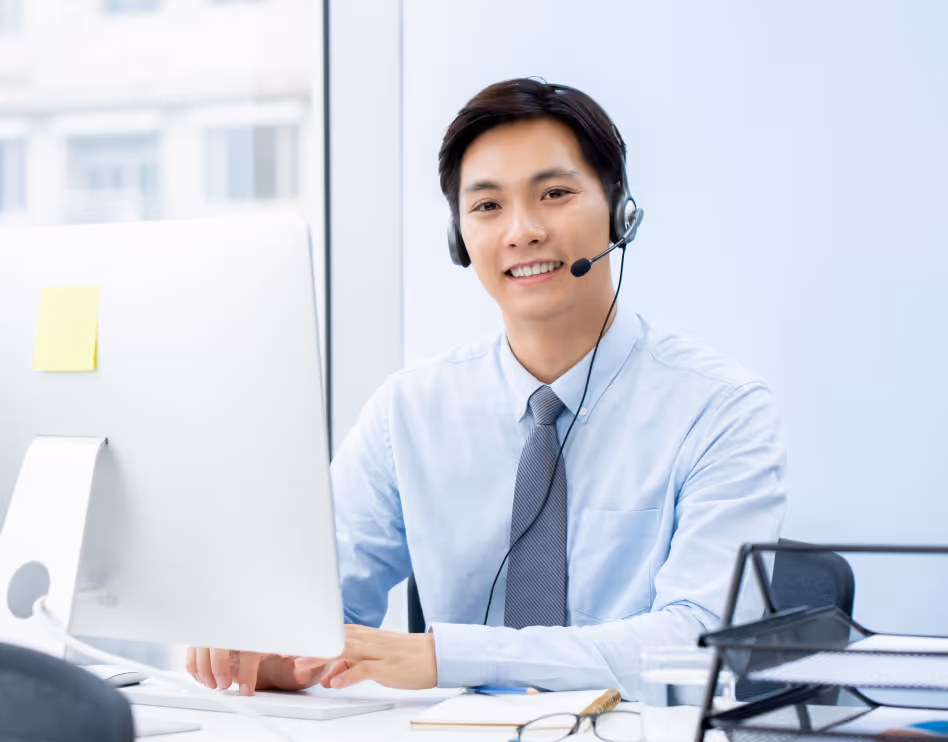 asian man telemarketer working in an office image