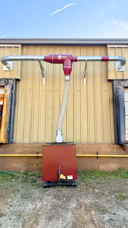 Legend Inline Separator installed with CTD and Hopper outside of a building.