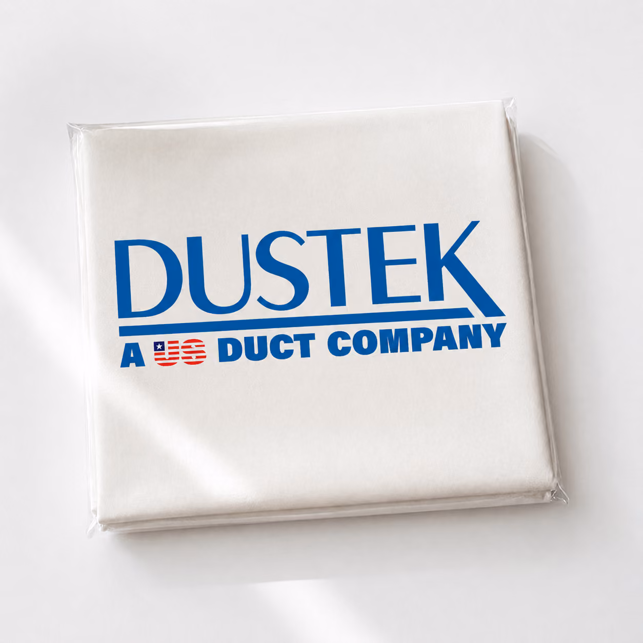 Folded Dustek filter bag packaged neatly in clear plastic, showcasing logo branding.