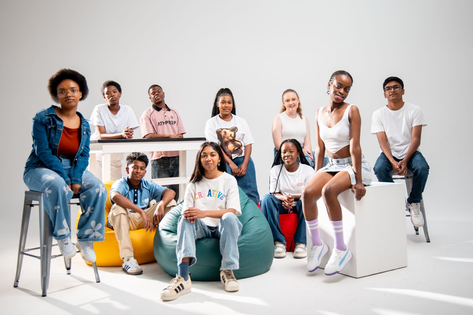 A group of South African teenagers posing together in a studio photo