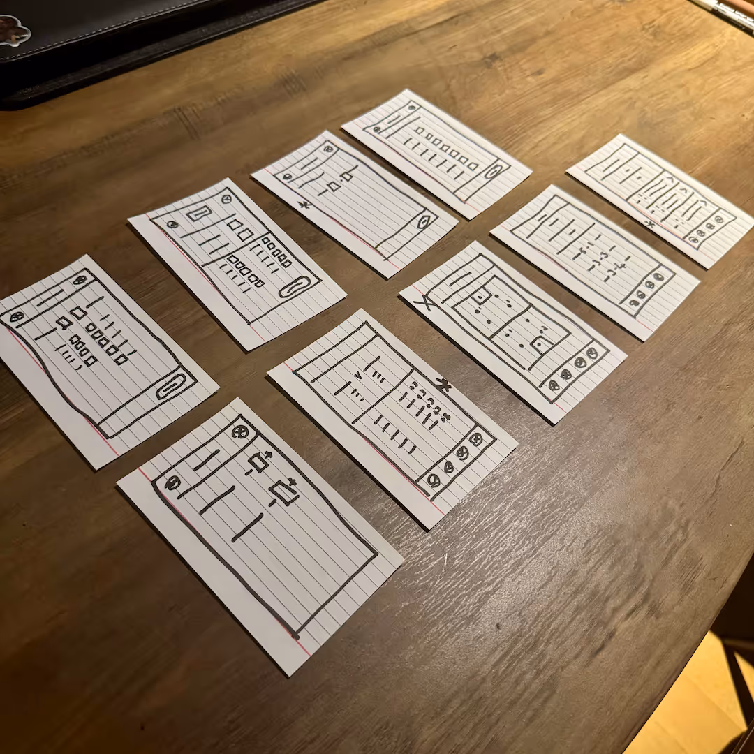 A selection of paper wireframes for the Megged app.