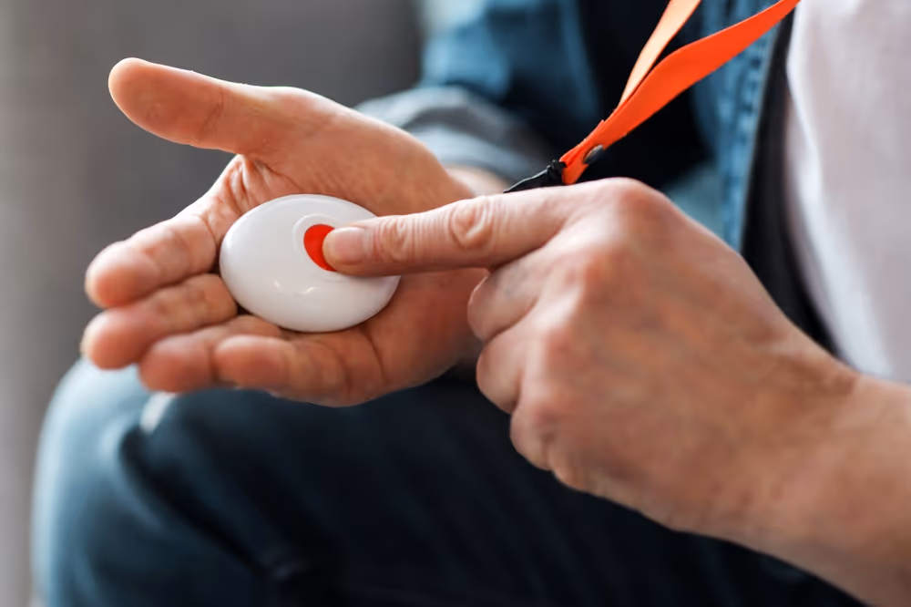 elderly man pushing panic button