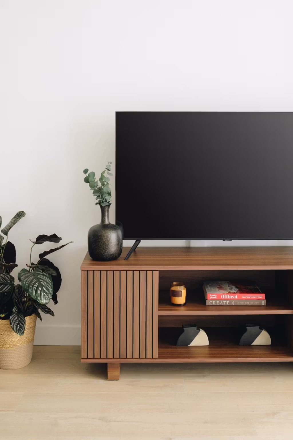 Bespoke TV stand in walnut with dowels