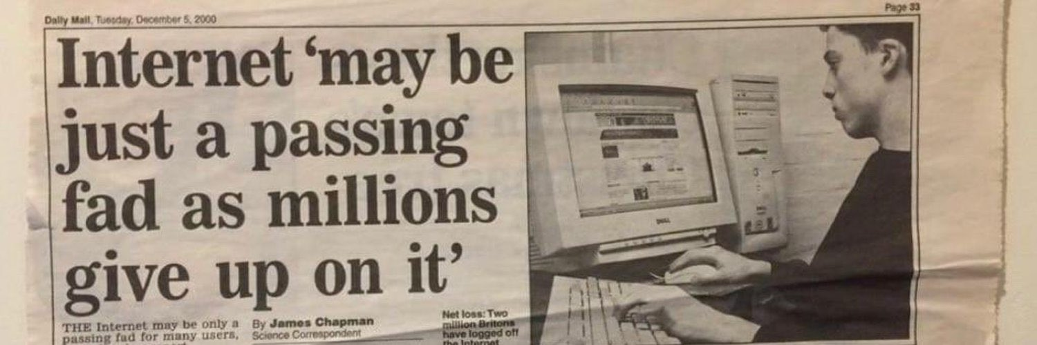 2000 Daily Mail newspaper headline predicting the internet as a passing fad, with image of man at desktop computer.