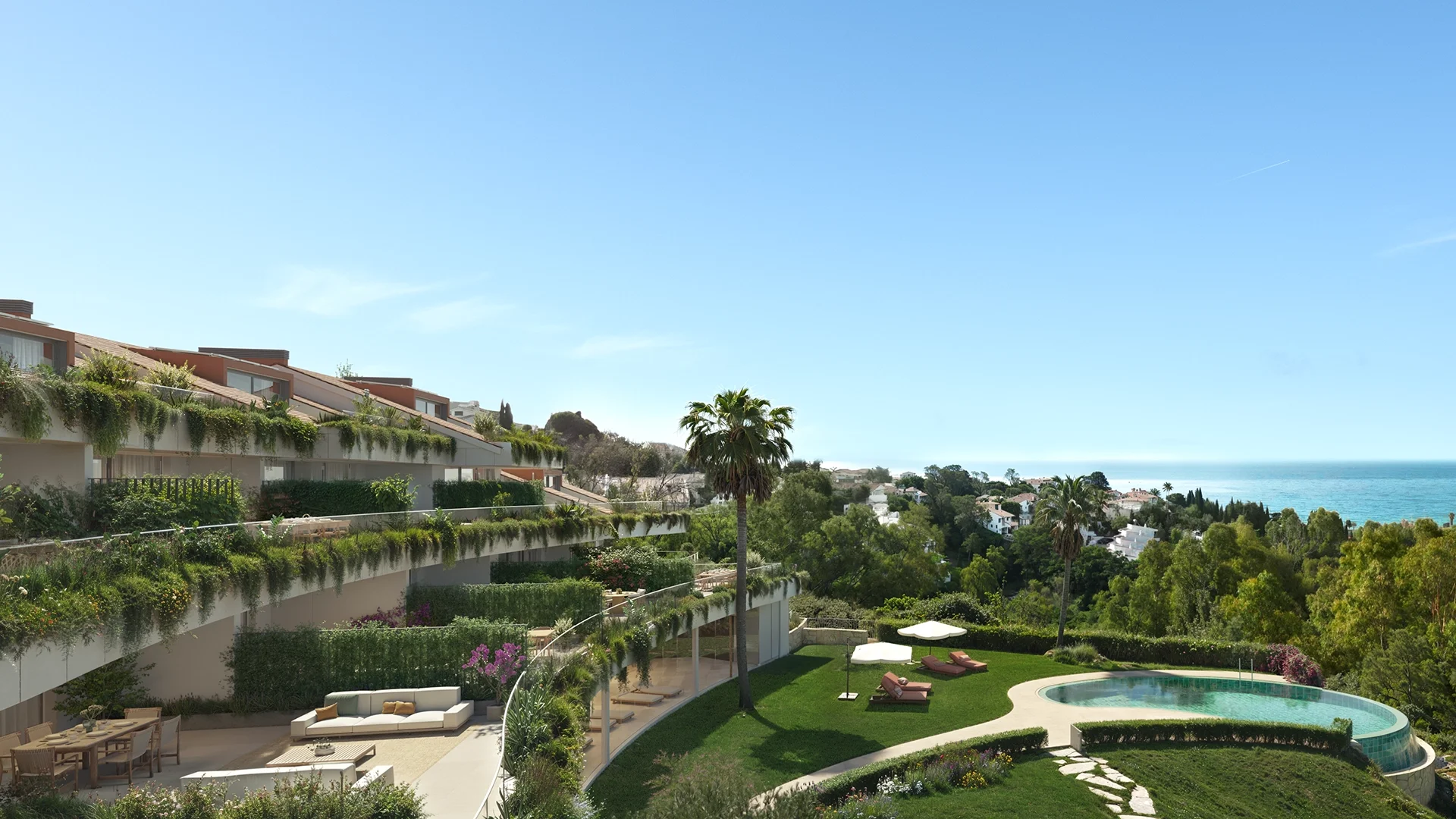 Rendering of a curved, plant-draped terraced building overlooking a lawn with a round infinity pool, sun loungers and the coastline beyond – Casatalaya Residences, a 3-bedroom apartment in Benalmádena, Málaga, Costa del Sol