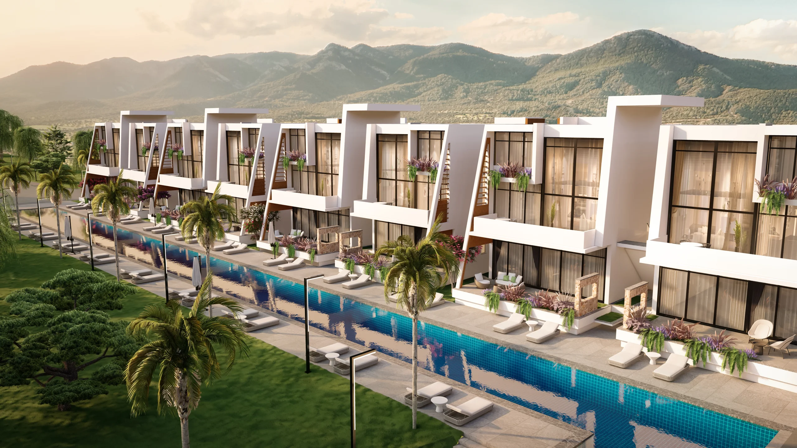 Rendering of a row of angular white townhouses with peaked balconies along a shared communal pool lined with sun loungers, set against mountains – La Casalia, a villa