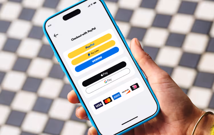 Smartphone displaying a PayPal checkout screen with payment options including PayPal, Pay Later, Venmo, Apple Pay, Google Pay, and credit cards.