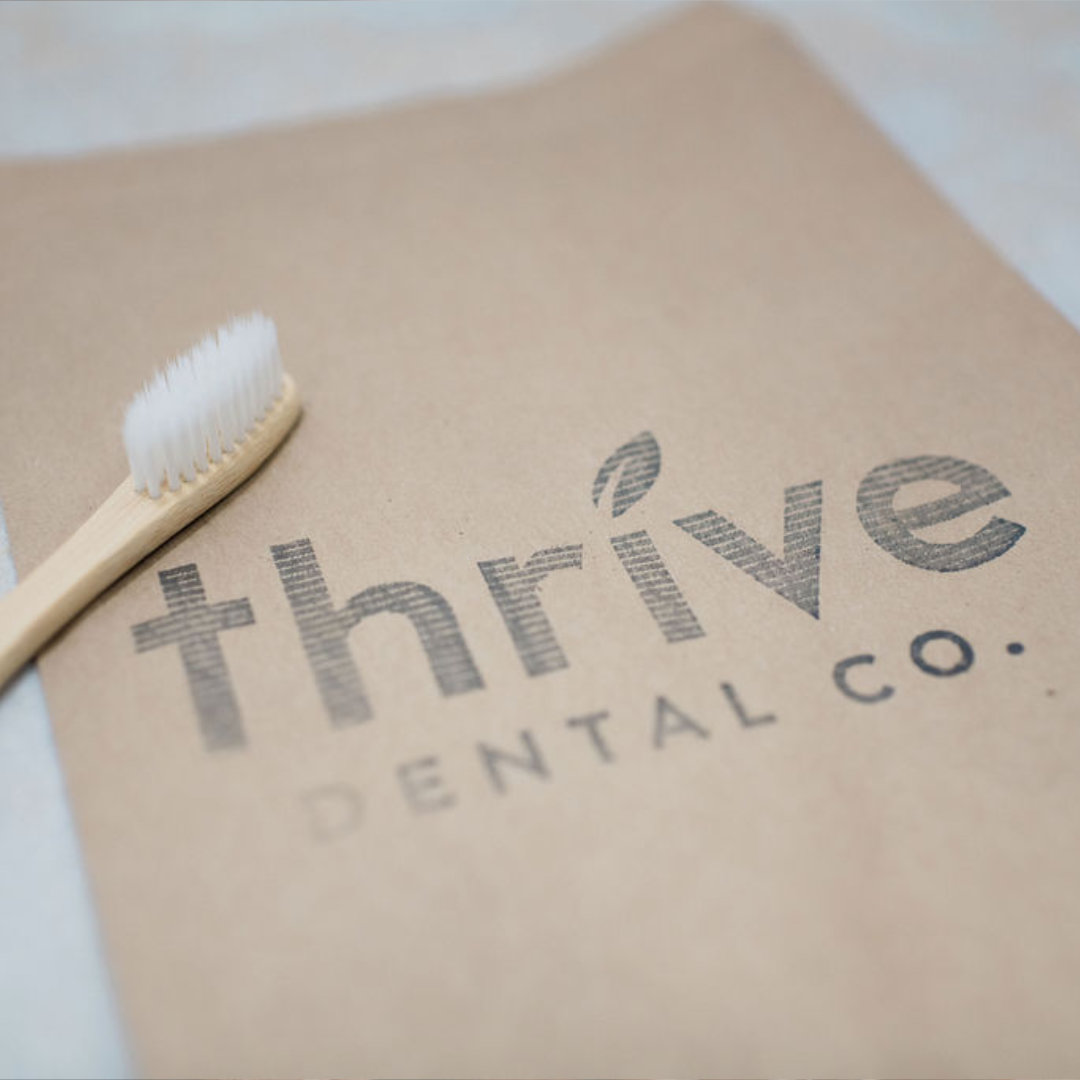Photo of a smiling patient wearing headphones