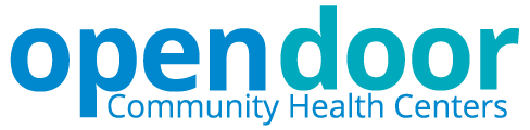 Logo of Grace Health with ‘grace’ in lowercase orange letters and a gray arc crossing the word above ‘HEALTH’ in uppercase gray letters.