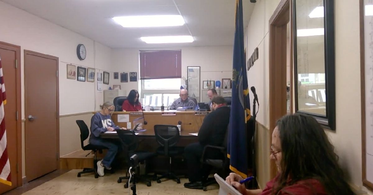 A senior man stressed out paying bills