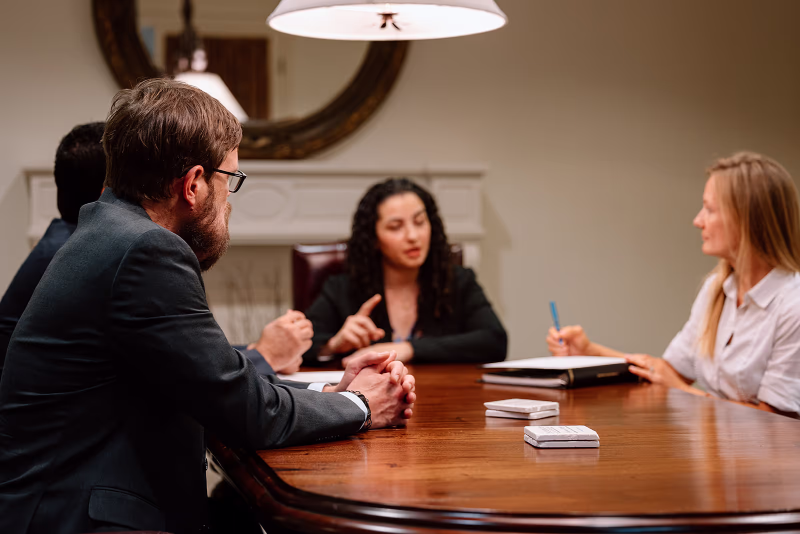 Attorneys talking around table