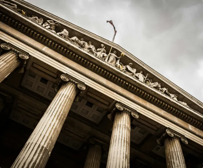 Classical courthouse facade with columns and sculptural pediment
