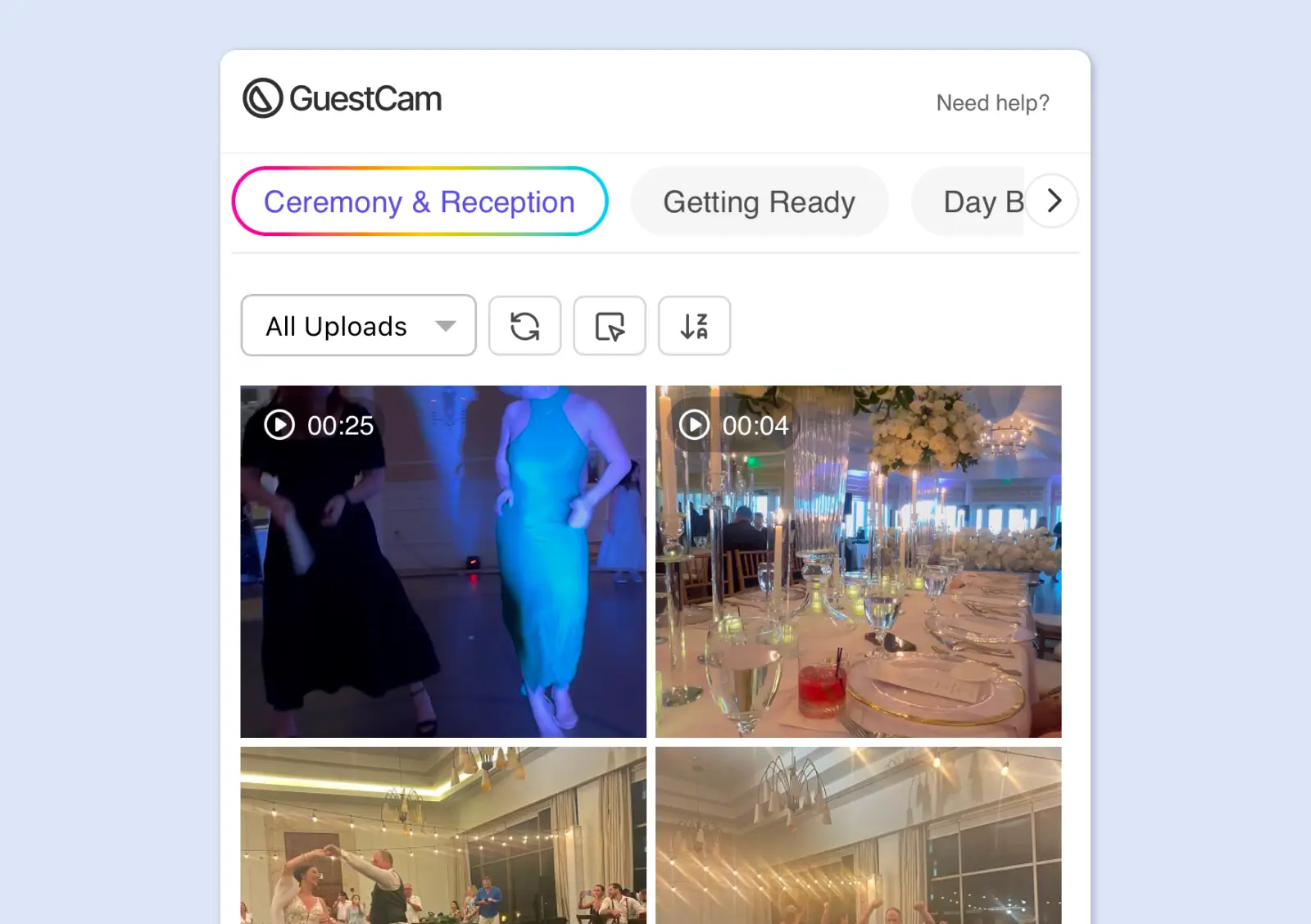 GuestCam wedding photo gallery showing guest uploaded photos and videos in a grid format