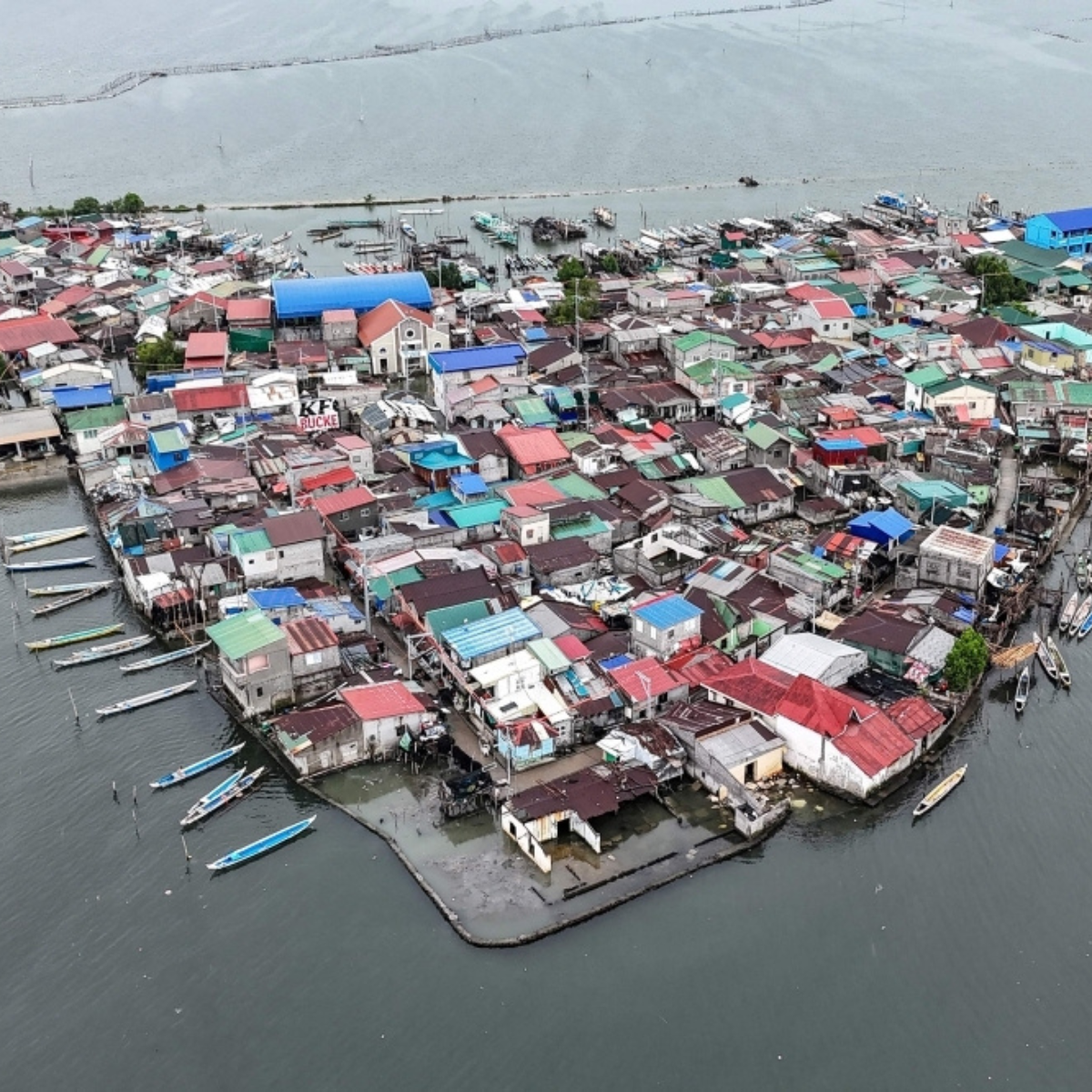 Sinking land, rising seas: Filipinos on Pugad Island struggle to hold on