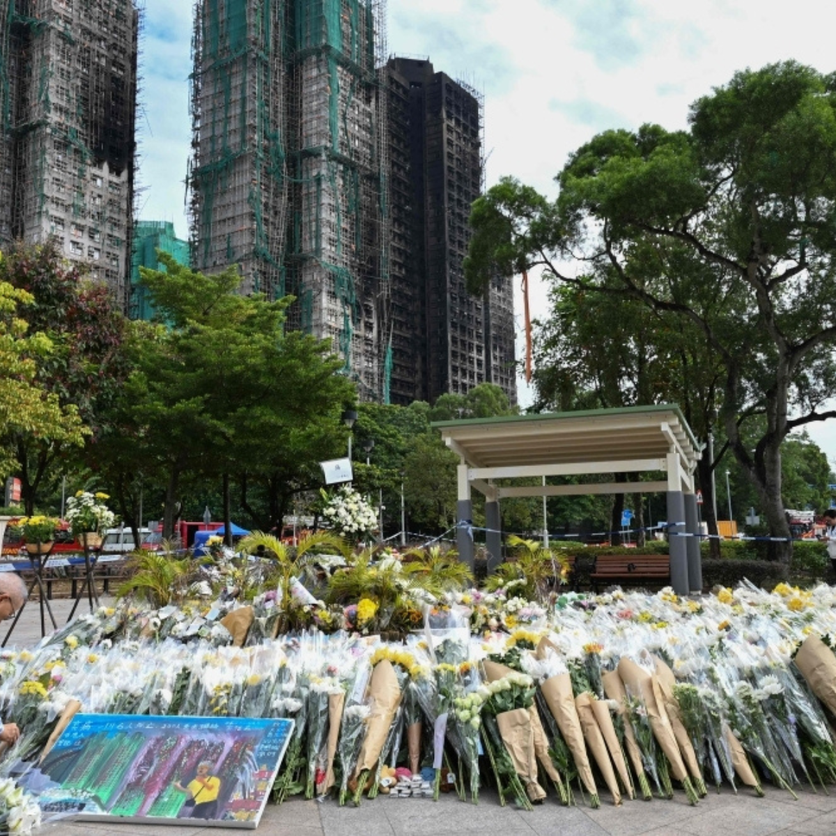 Turnout fears as Hong Kong votes under shadow of deadly housing-block blaze