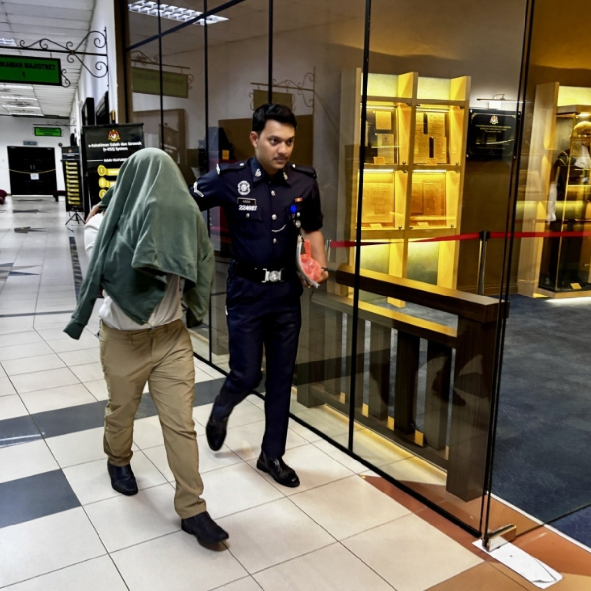 Man pleads not guilty to alleged puppy maiming in Kuching, father also faces charge for false report