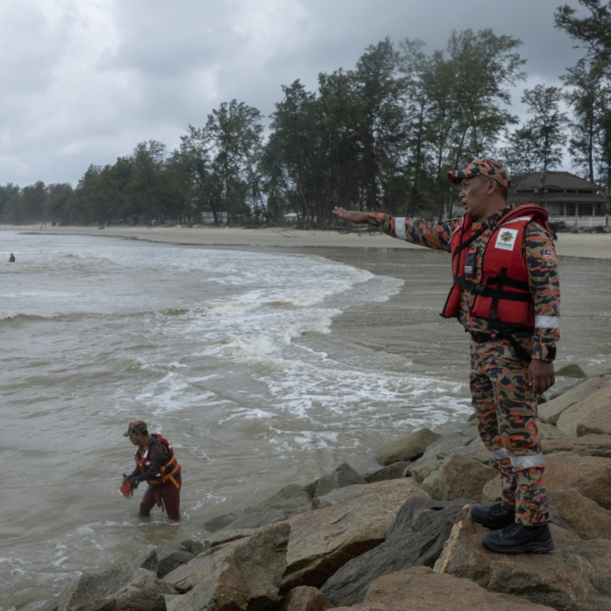 Younger brother’s body discovered 200 metres away from firefighter sibling at Pantai Kandis.