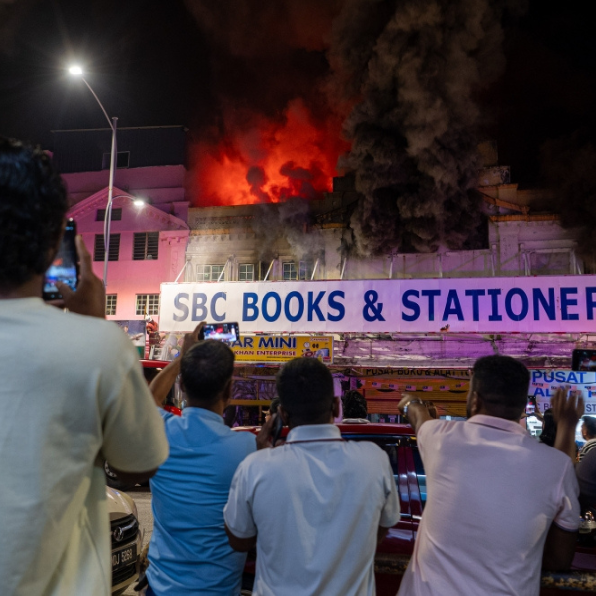 Firefighters tackle raging bookshop blaze and hillside forest fire in Seremban; no injuries reported