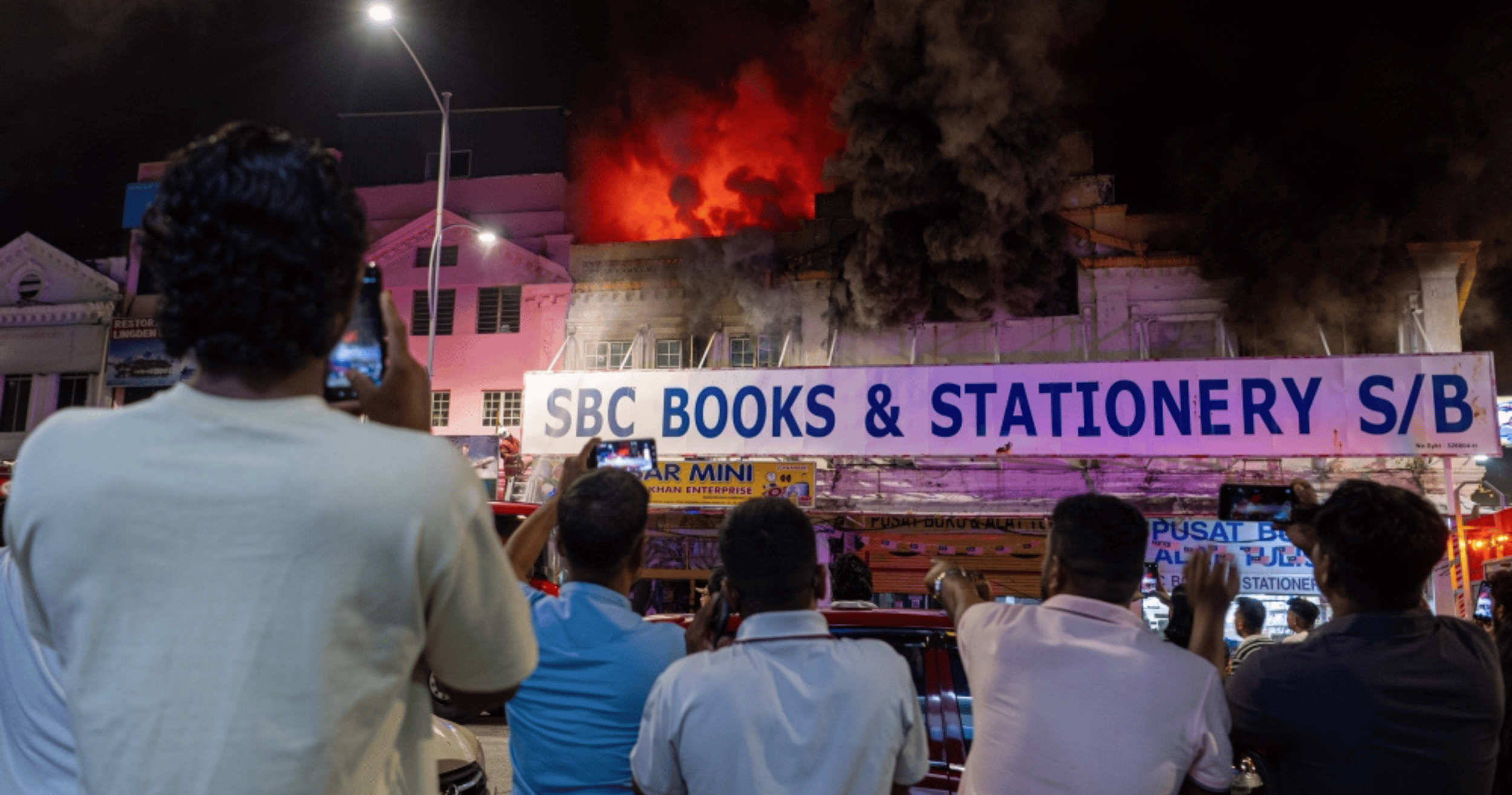 Firefighters tackle raging bookshop blaze and hillside forest fire in Seremban; no injuries reported