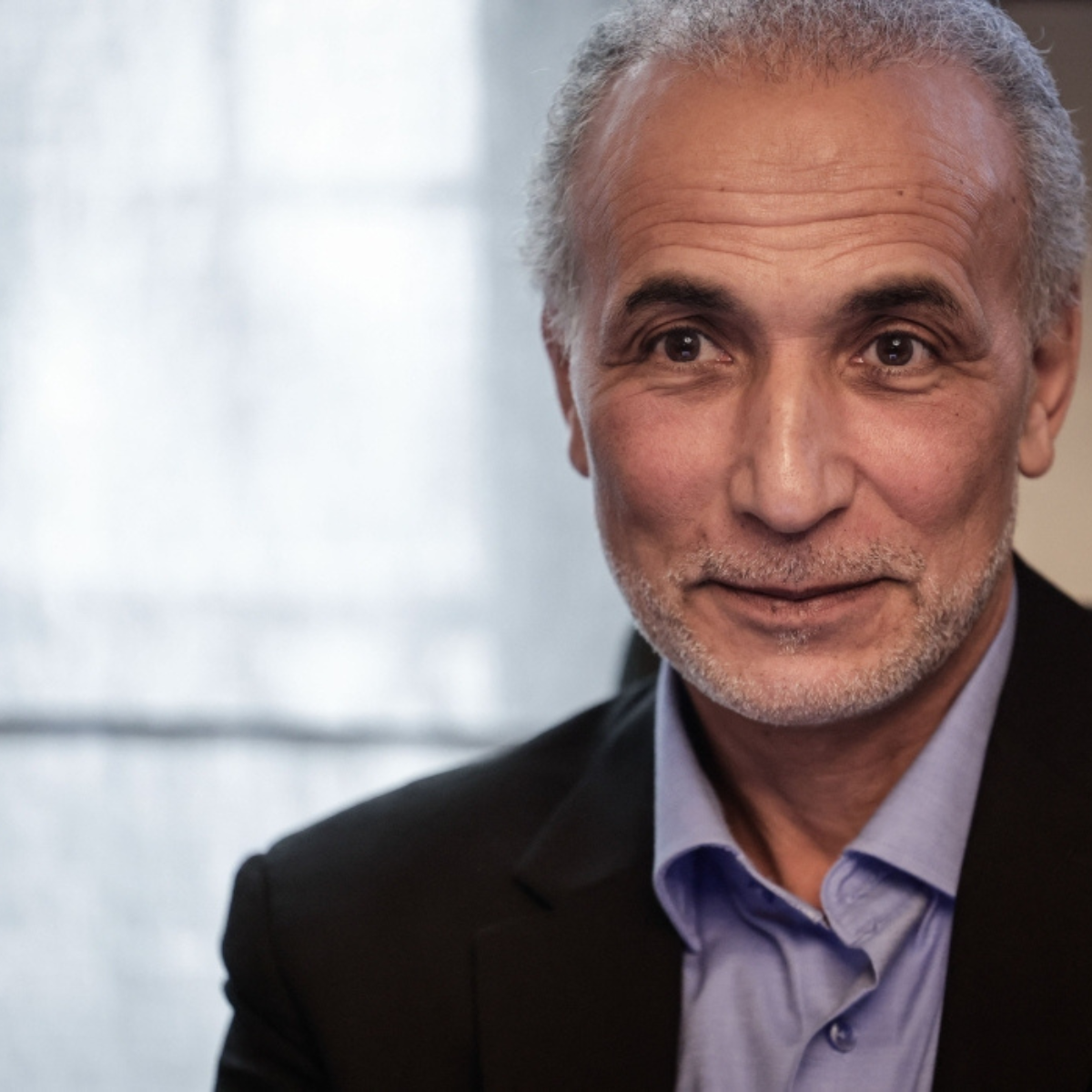 Paris court sentences Swiss Islamic scholar Tariq Ramadan to 18 years in prison for rape