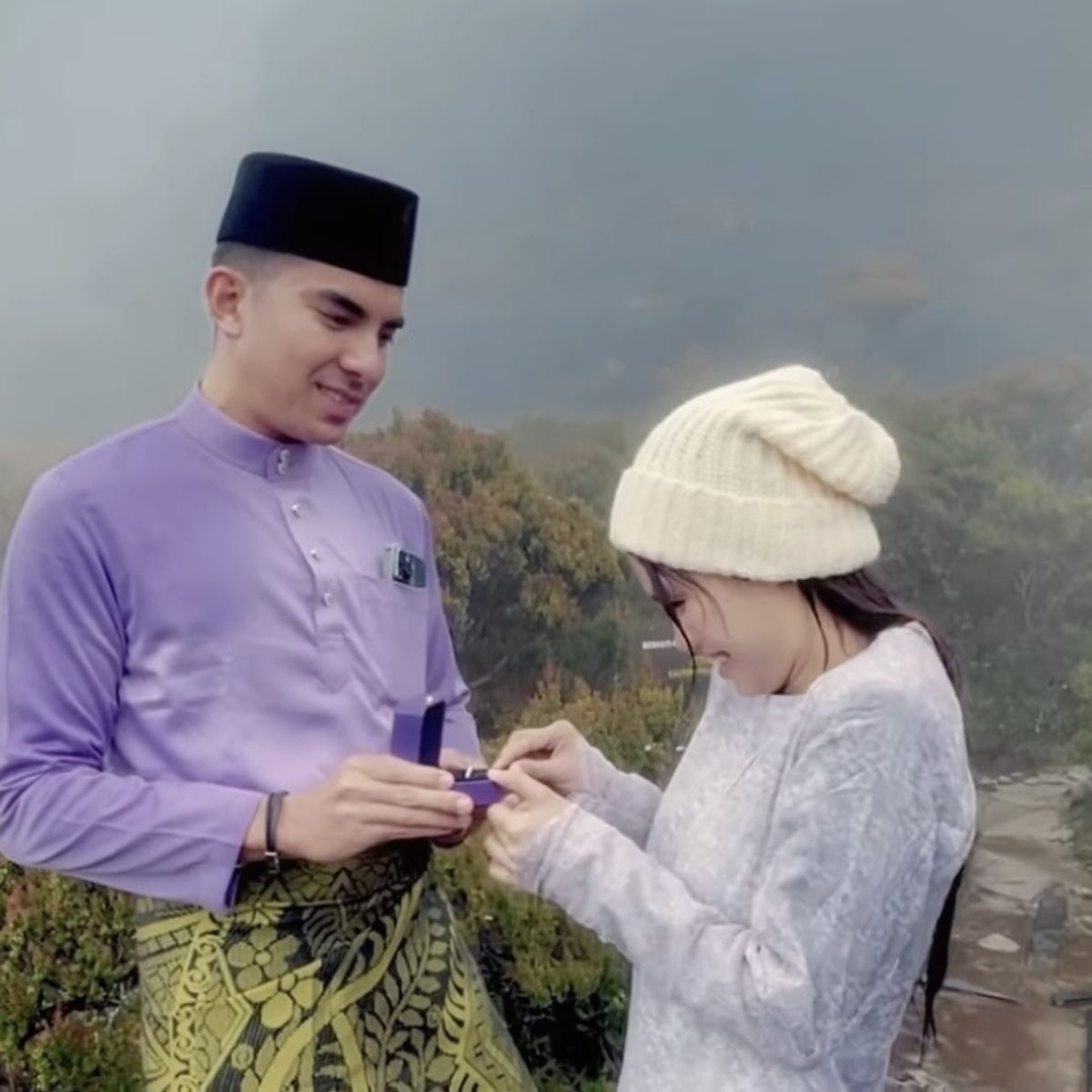 #BellaSyedYes: Syed Saddiq and Bella Astillah announce engagement following a romantic proposal on Mount Kinabalu (VIDEO)