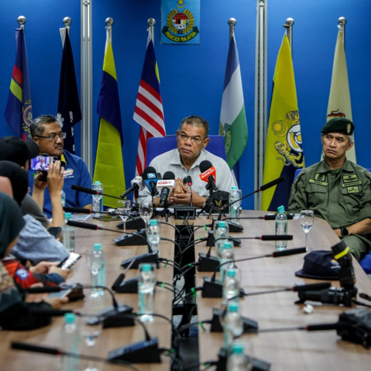 Home minister says police may pursue extradition to return overseas suspects in ‘corporate mafia’ investigation.