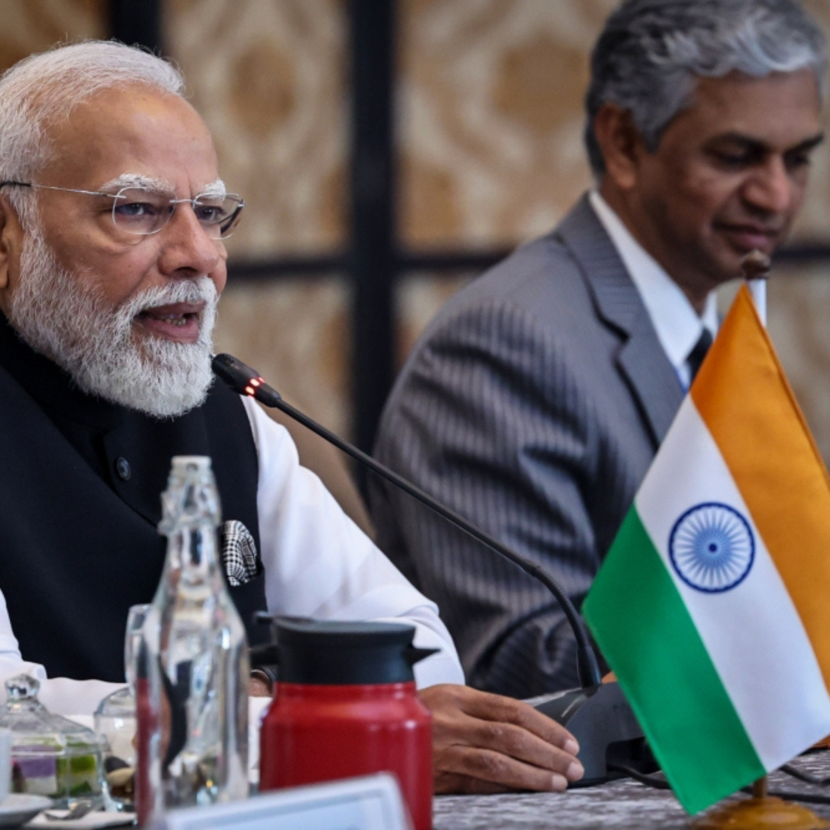 India’s Modi advances plan to expand Parliament and reserve seats for women amid opposition protests